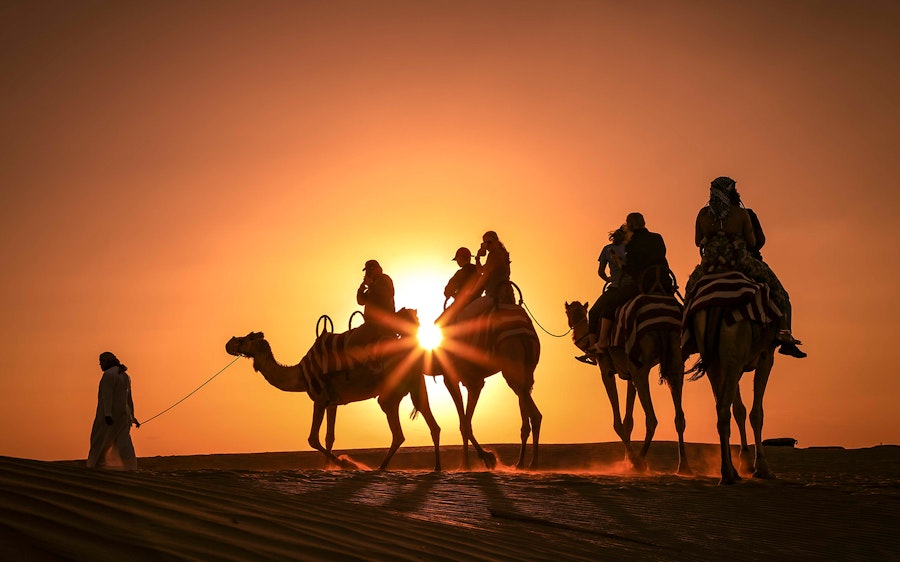Premium Sunset Camel Trek with Shows & BBQ Dinner at Al Khayma