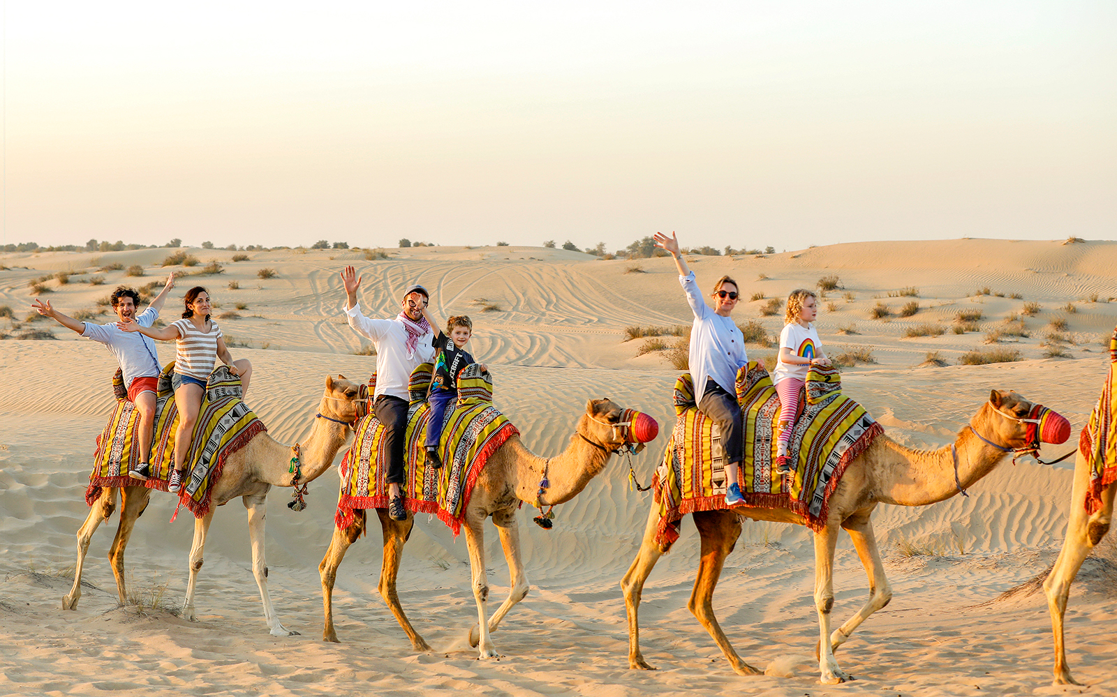 Camel ride at Al Marmoon Oasis Bedouin Camp during Heritage Safari by Vintage Mercedes.