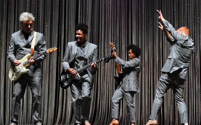 Musicians performing on stage in David Byrne's American Utopia show.