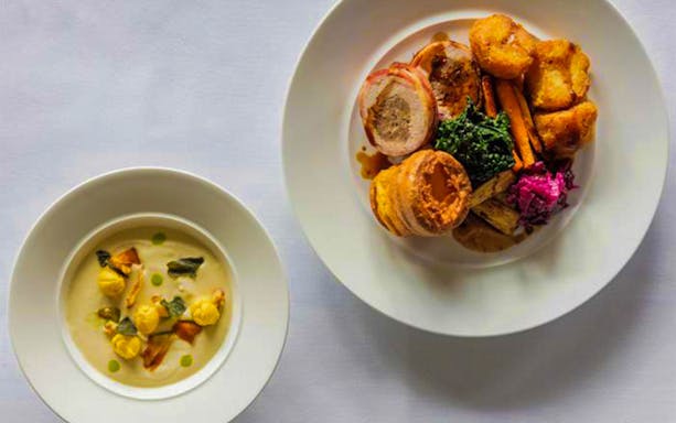 Plated gourmet meal served on Bateaux London dinner cruise on the Thames.