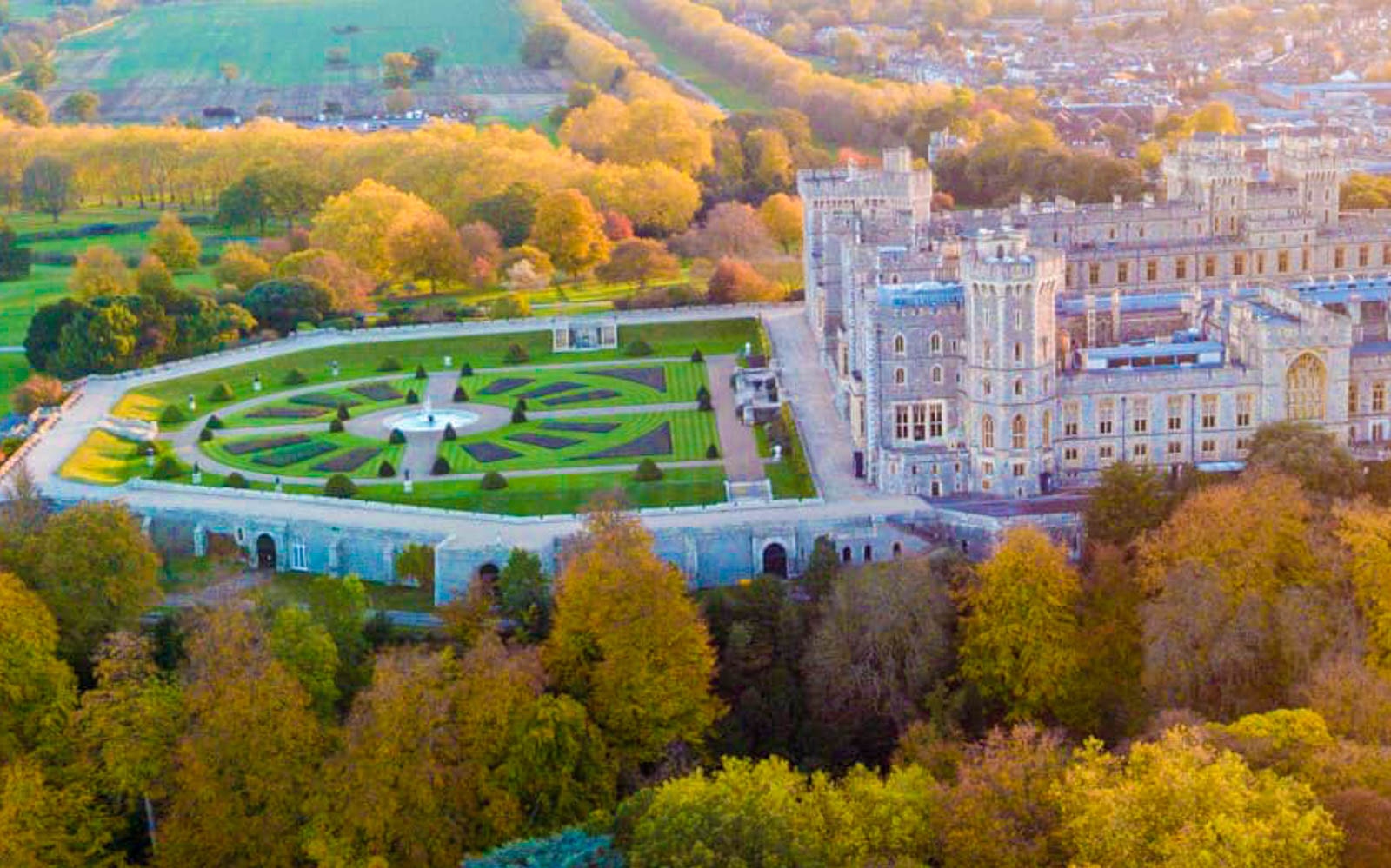 Aerial view of Windsor Castle gardens and surrounding landscape.