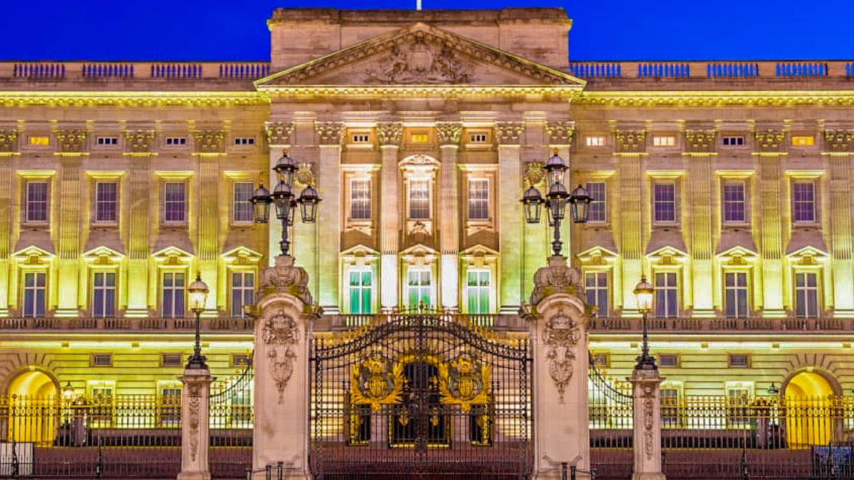 Buckingham Palace illuminated at night, London, part of guided tour with Windsor Castle.