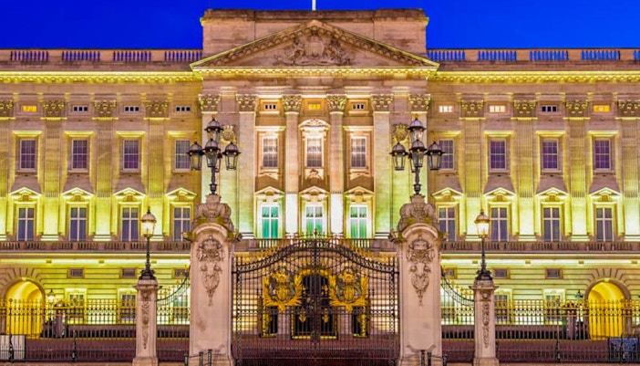 Buckingham Palace illuminated at night, London, part of guided tour with Windsor Castle.