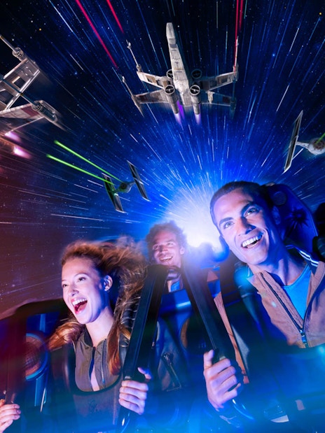 Guests enjoying a Star Wars-themed ride at Disneyland Paris.