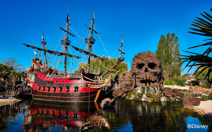 Pirate ship and skull rock at Pirates of the Caribbean, Disneyland Paris.