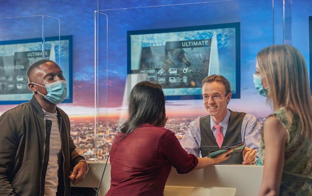 Visitors at ticket counter for The View from The Shard, London.