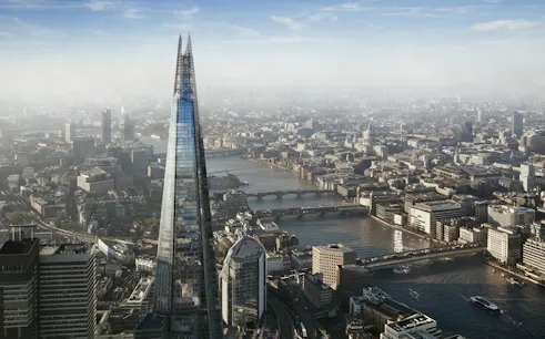 Aerial view of The Shard and London skyline with River Thames.