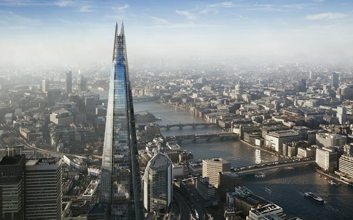 Aerial view of The Shard and London skyline with River Thames.