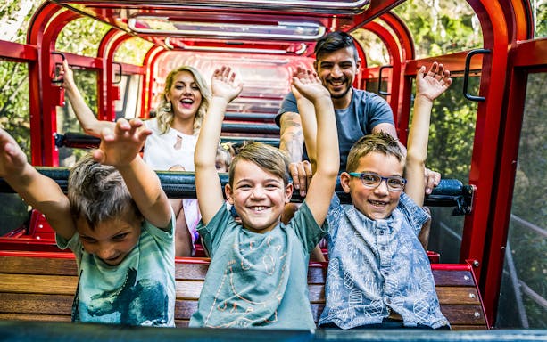 Children and adults enjoying a ride at Blue Mountains Scenic World, Australia.