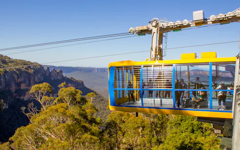 Cable car with tourists overlooking Blue Mountains, Australia.