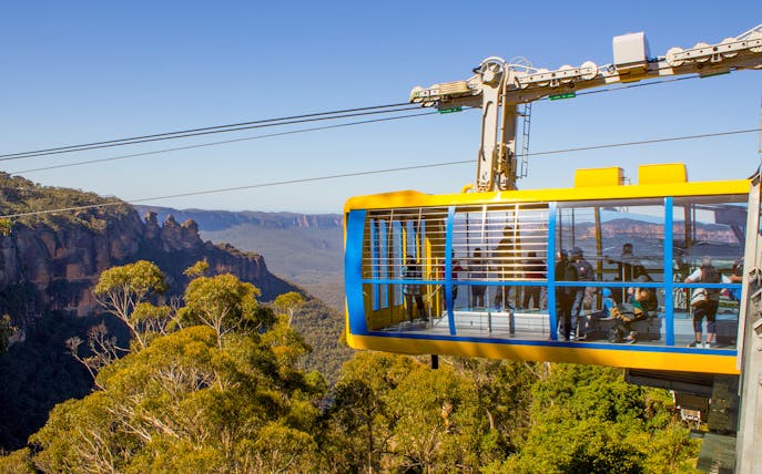 Cable car with tourists overlooking Blue Mountains, Australia.