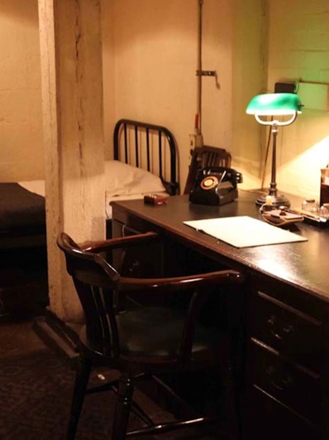 Churchill's War Rooms desk and bed in London, part of WWII Westminster Walking Tour.