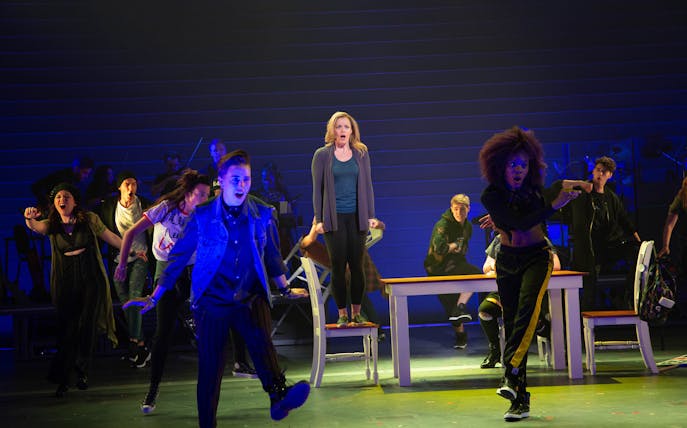 Performers on stage during a scene from the musical "Jagged Little Pill.