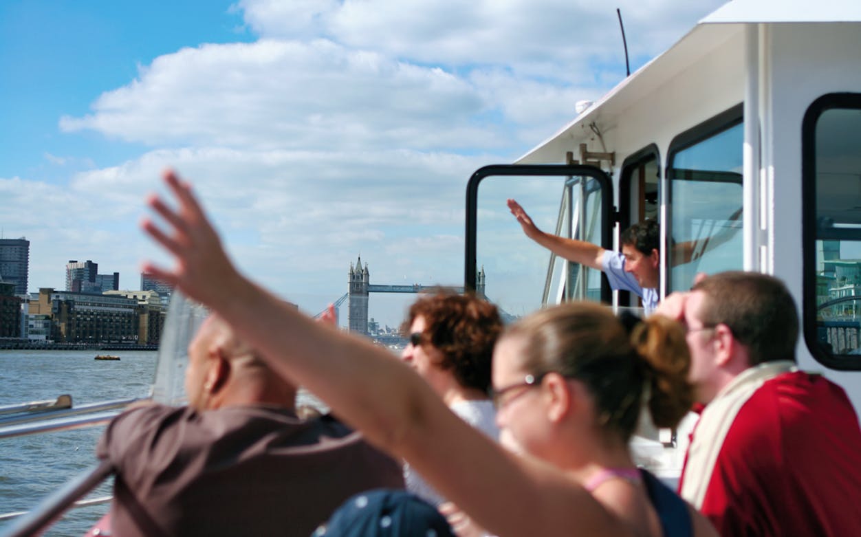 Boat tour on the Thames with view of Tower Bridge, London.