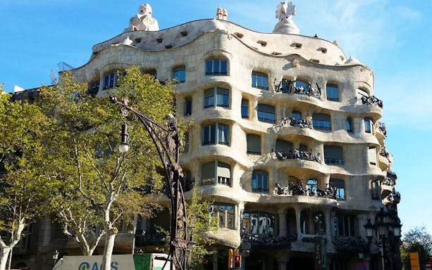 La Pedrera's unique facade in Barcelona, part of the Park Güell & La Pedrera Guided Tour.