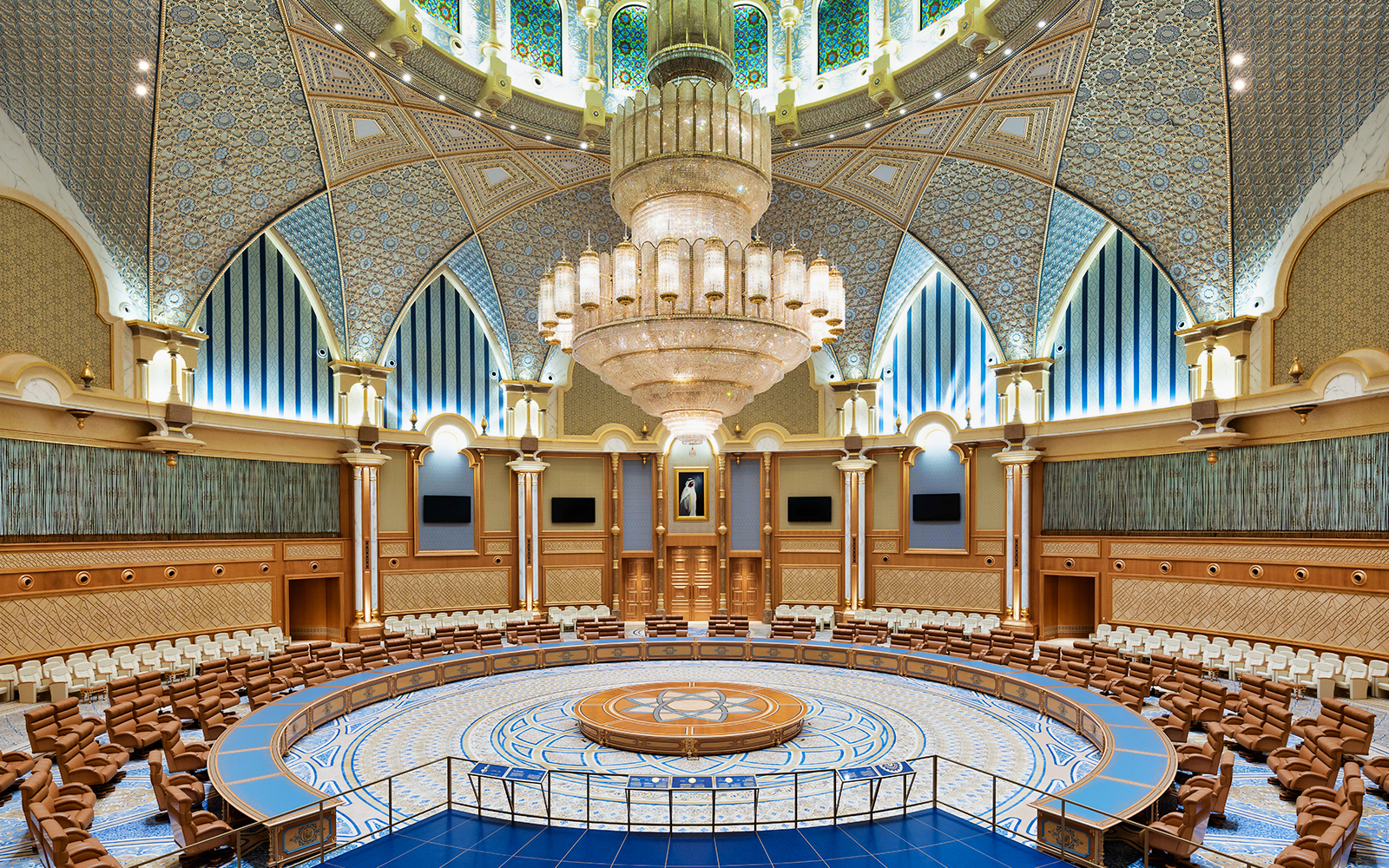 Qasr Al Watan's grand hall with intricate ceiling and large chandelier, Abu Dhabi.