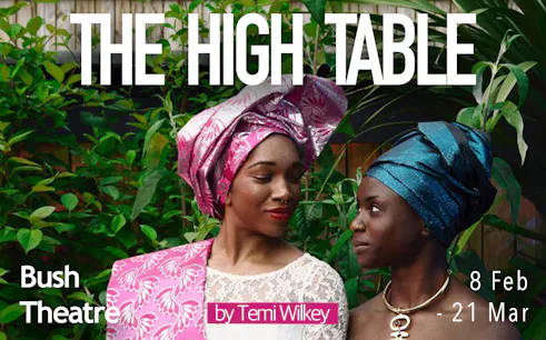 Two people in colorful headwraps at Bush Theatre for "The High Table" by Temi Wilkey.