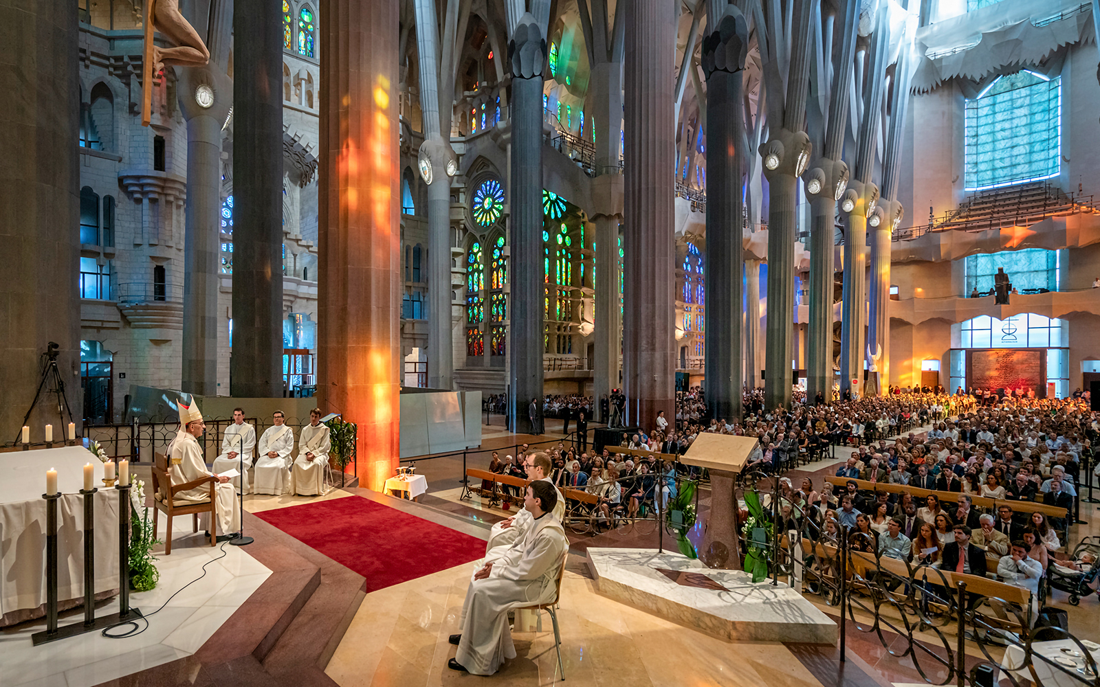 Sagrada Familia interior with stained glass windows during a small group tour in Barcelona.