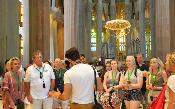 Tour group inside Sagrada Familia with guide, Barcelona.