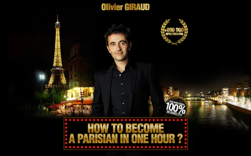 Comedian in front of Eiffel Tower promoting "How To Become A Parisian in One Hour?" show in Paris.