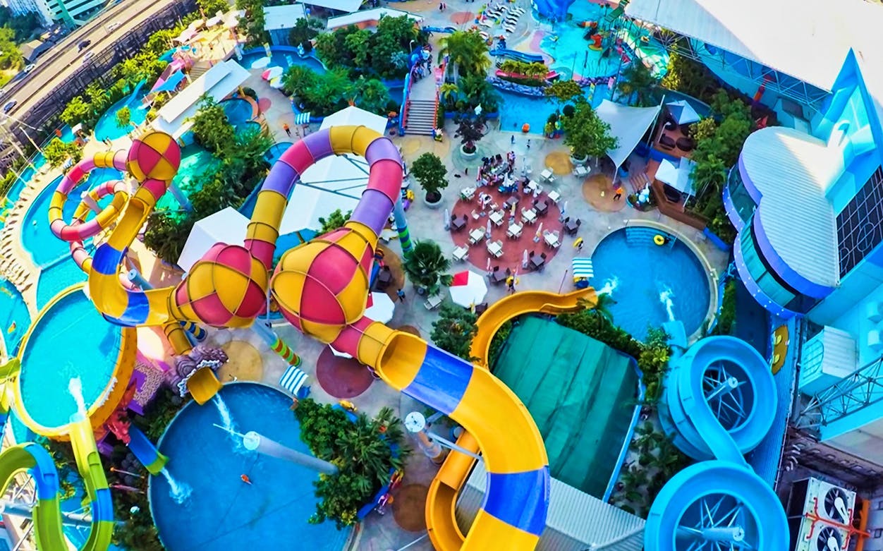 Pororo AquaPark Bangkok aerial view with colorful water slides and pools.