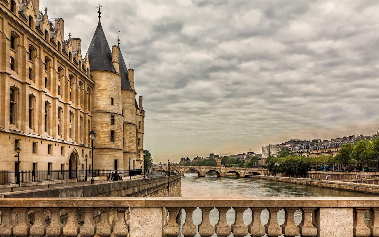 Marie Antoinette Pass ticket with Versailles Palace in the background, Paris, France.