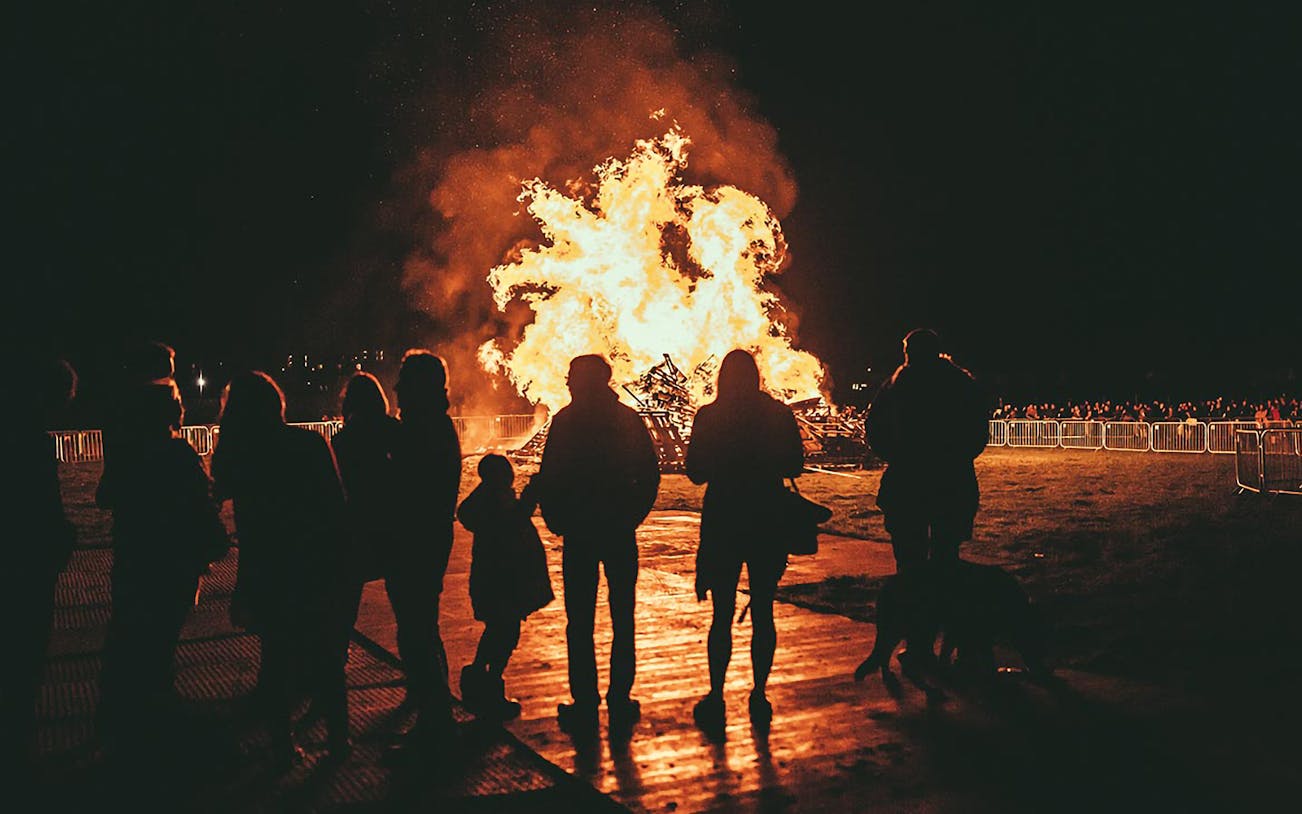 Crowd watching bonfire at Morden Park Fireworks Display.