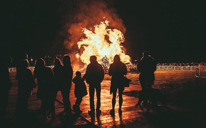 Crowd watching bonfire at Morden Park Fireworks Display.