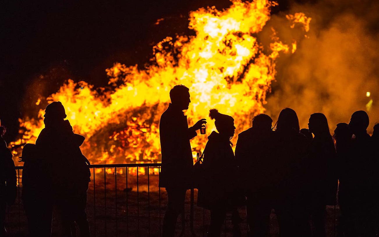 Crowd watching bonfire at Wimbledon Park Fireworks Display.