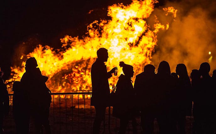 Crowd watching bonfire at Wimbledon Park Fireworks Display.