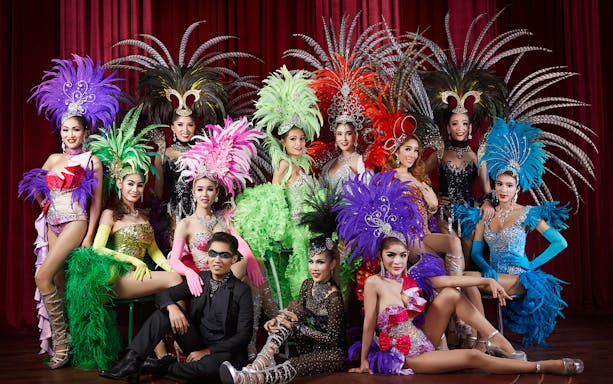 Performers in vibrant costumes at Alcazar Cabaret Pattaya, Thailand.