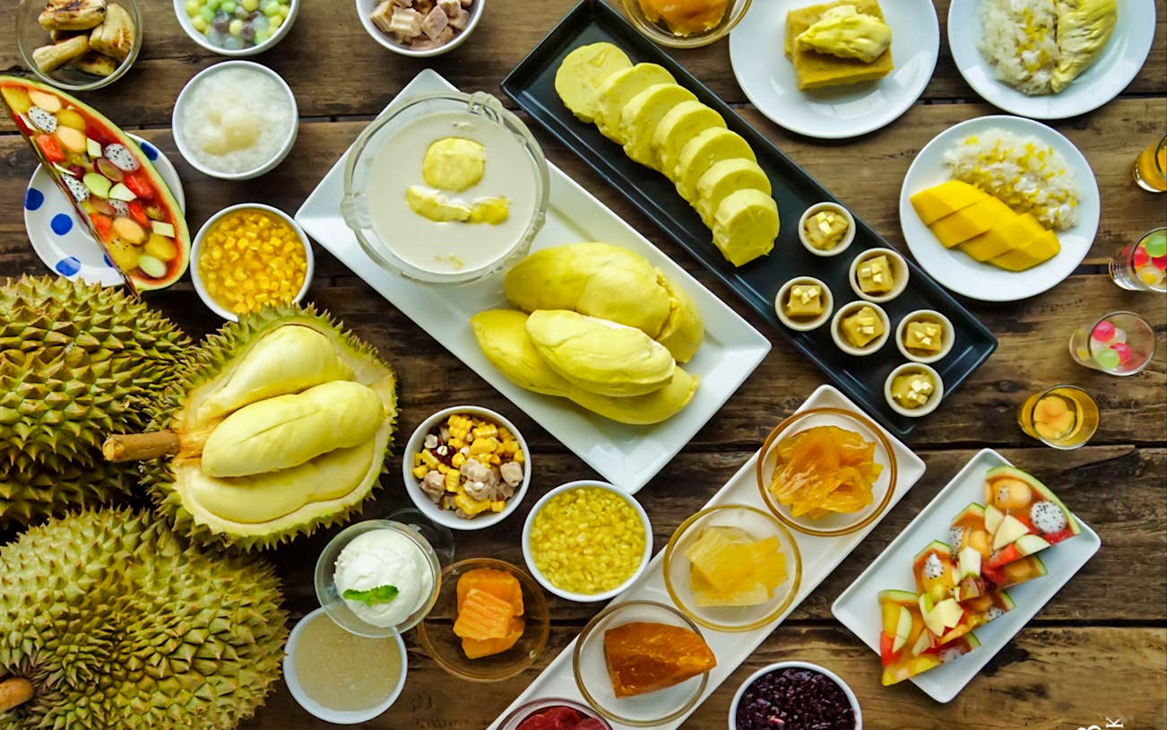 Fruit buffet with durian, mango, and assorted desserts at Baiyoke Sky Hotel 18th Floor.