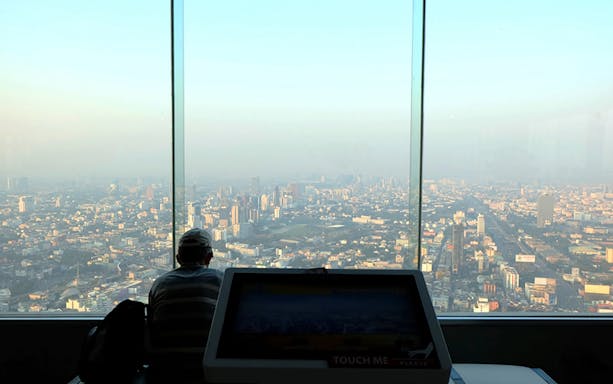 Baiyoke Sky Hotel observation deck view of Bangkok skyline from 77th floor.