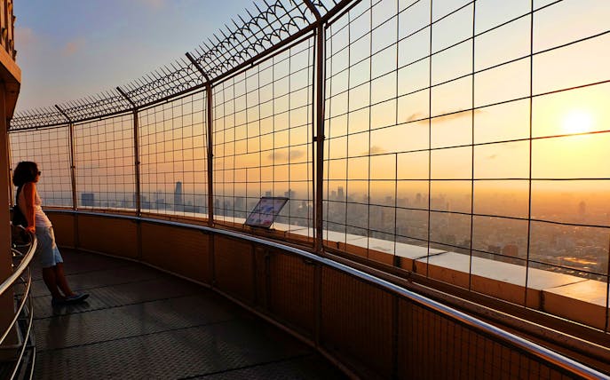 Observation deck view from Baiyoke Sky Hotel, Bangkok, at sunset.
