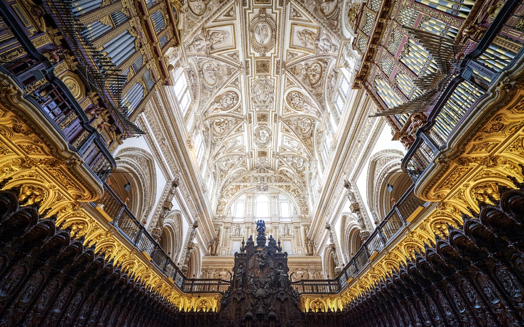 Ceiling and organ pipes inside Cordoba Mosque-Cathedral, Spain.