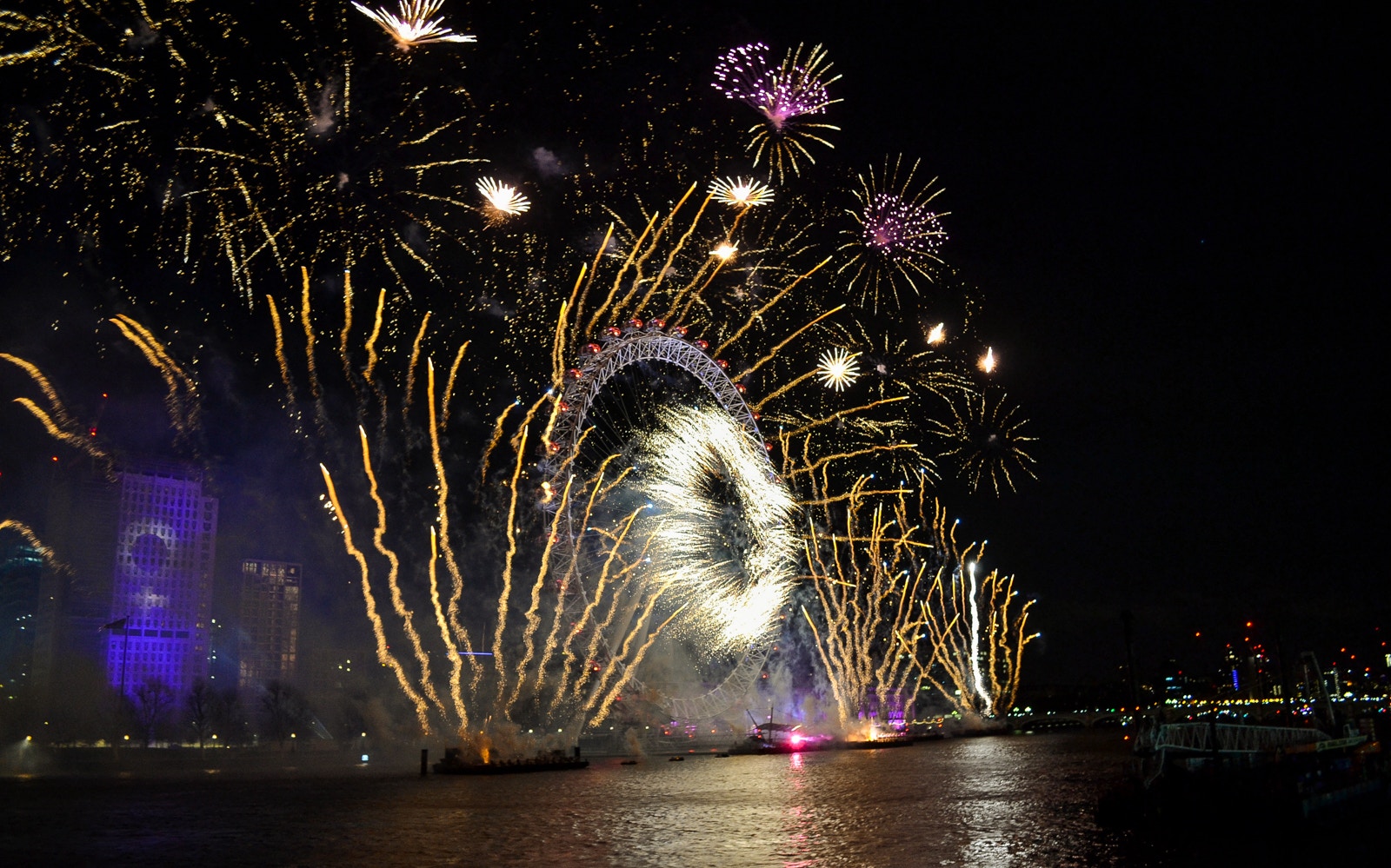 Fireworks over the London Eye during New Year’s Eve dinner cruise on the Thames.
