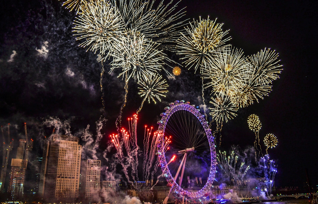 Fireworks over the London Eye during New Year’s Eve cruise.