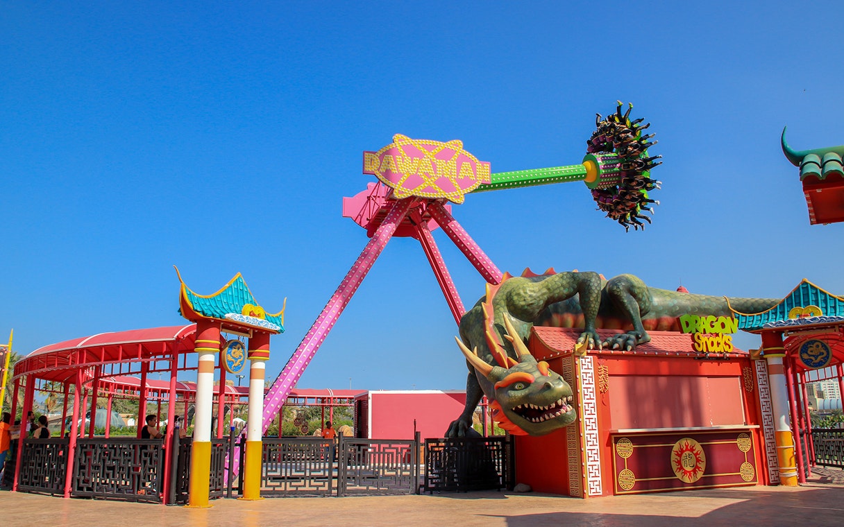 Ride at Al Montazah Water Park featuring a dragon-themed attraction.