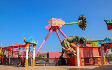 Ride at Al Montazah Water Park featuring a dragon-themed attraction.