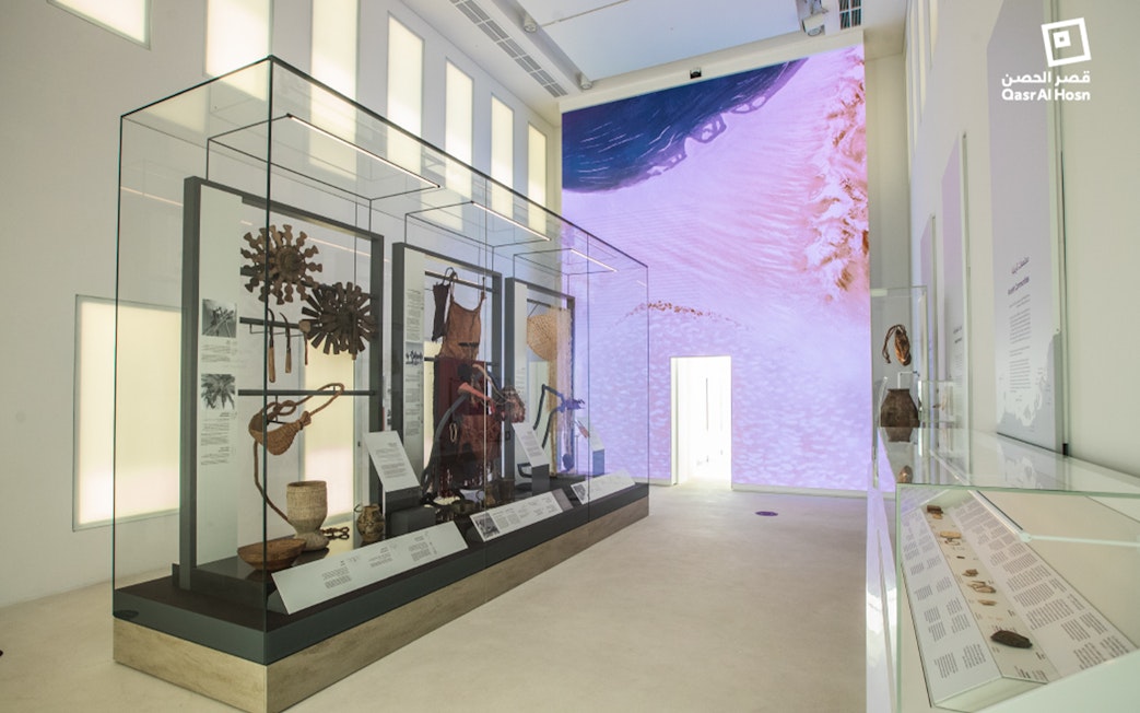 Qasr Al Hosn museum exhibit with historical artifacts in Abu Dhabi.