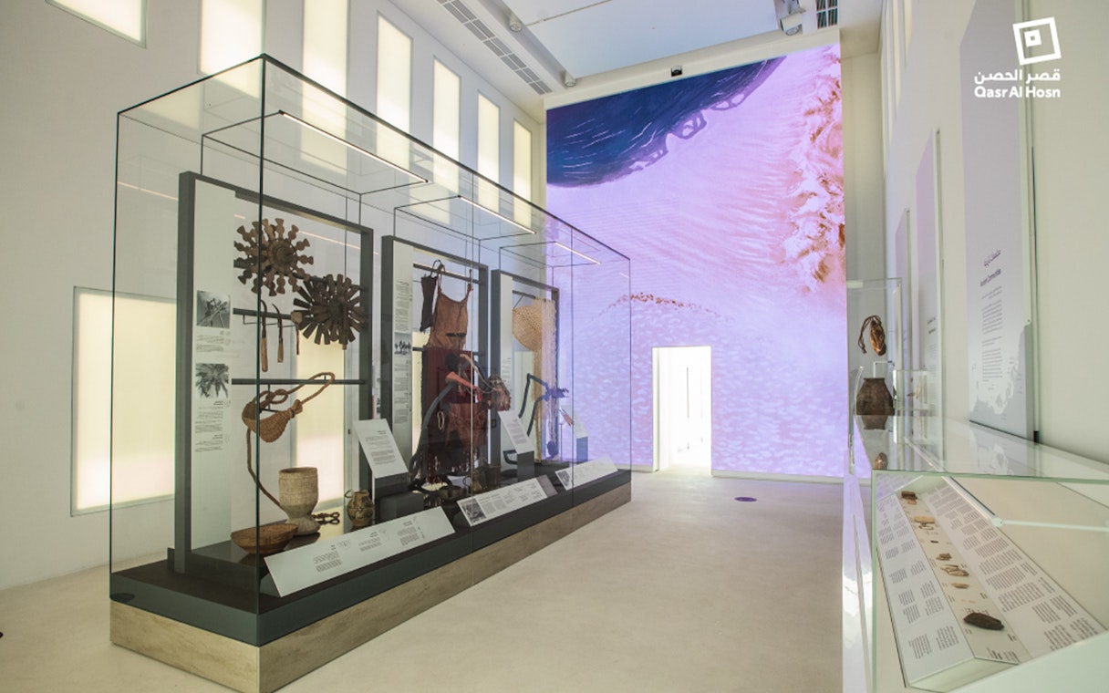 Qasr Al Hosn museum exhibit with historical artifacts in Abu Dhabi.