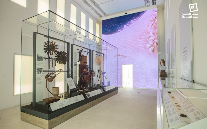 Qasr Al Hosn museum exhibit with historical artifacts in Abu Dhabi.