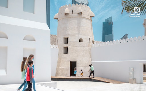 Visitors exploring Qasr Al Hosn fort in Abu Dhabi.