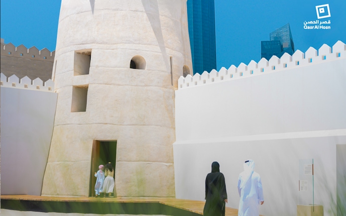 Visitors entering Qasr Al Hosn fort in Abu Dhabi, UAE.