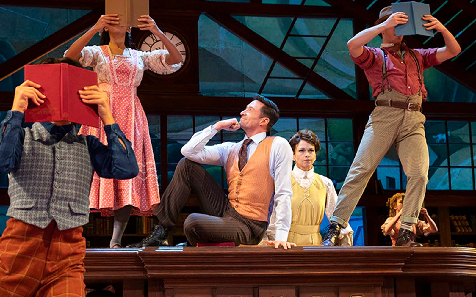 Performers on stage in a scene from "The Music Man" musical.