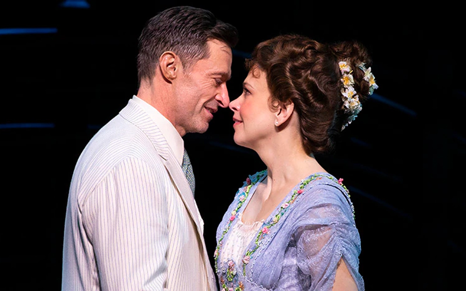 Actors performing a scene from "The Music Man" musical.