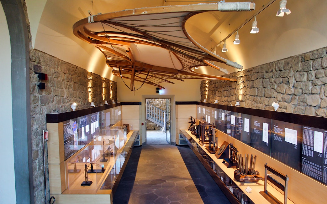Leonardo Da Vinci Museum exhibit with flying machine model and interactive displays.