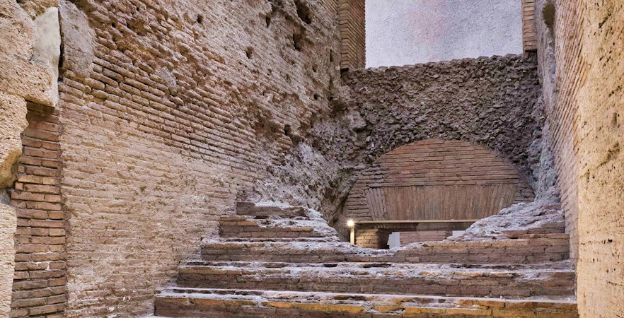 Ancient brick steps in Rome's Navona Square underground passage.