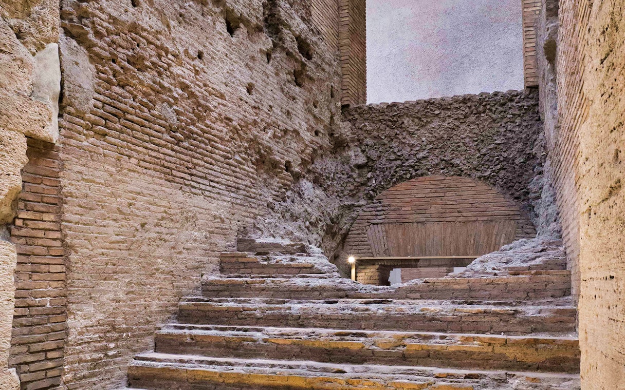Ancient brick steps in Rome's Navona Square underground passage.