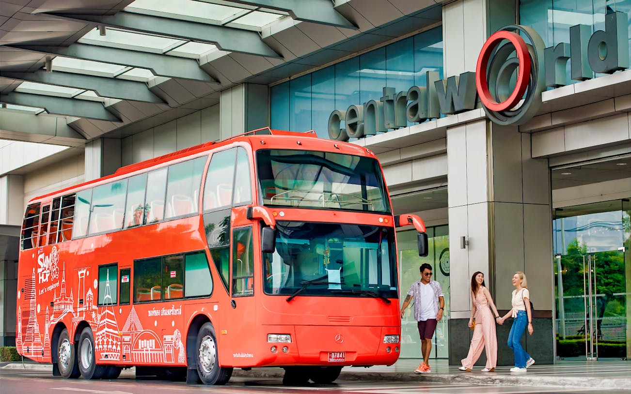 Red double-decker bus at CentralWorld, Bangkok for Siam Hop-On-Hop-Off Sightseeing Tour.